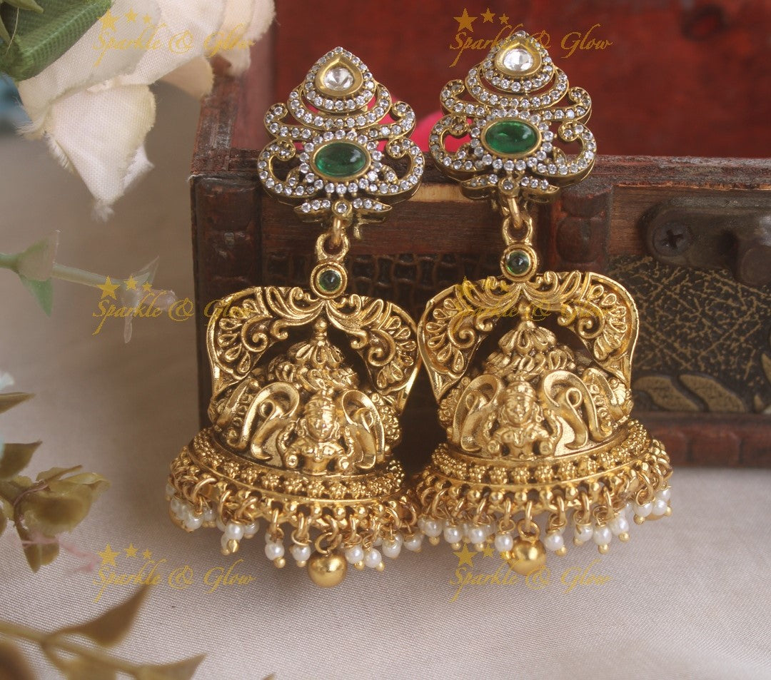 Beautiful Idol Lakshmi Crown design Jhumukas with emerald stone