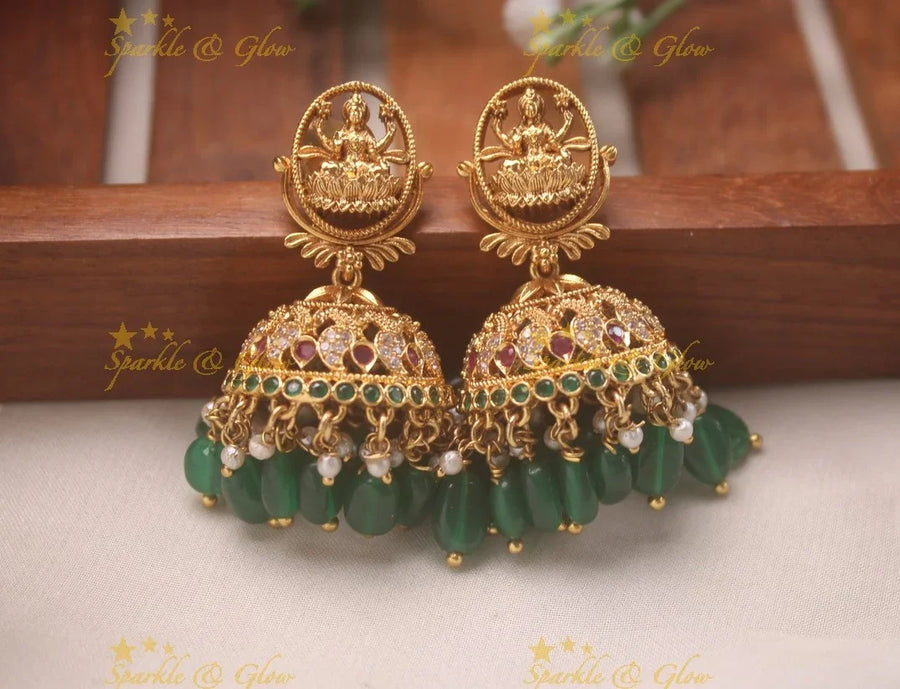 Circle Lakshmi Studded Kemp Peacock Jhumukas With Green Beads - Sparkle and Glow