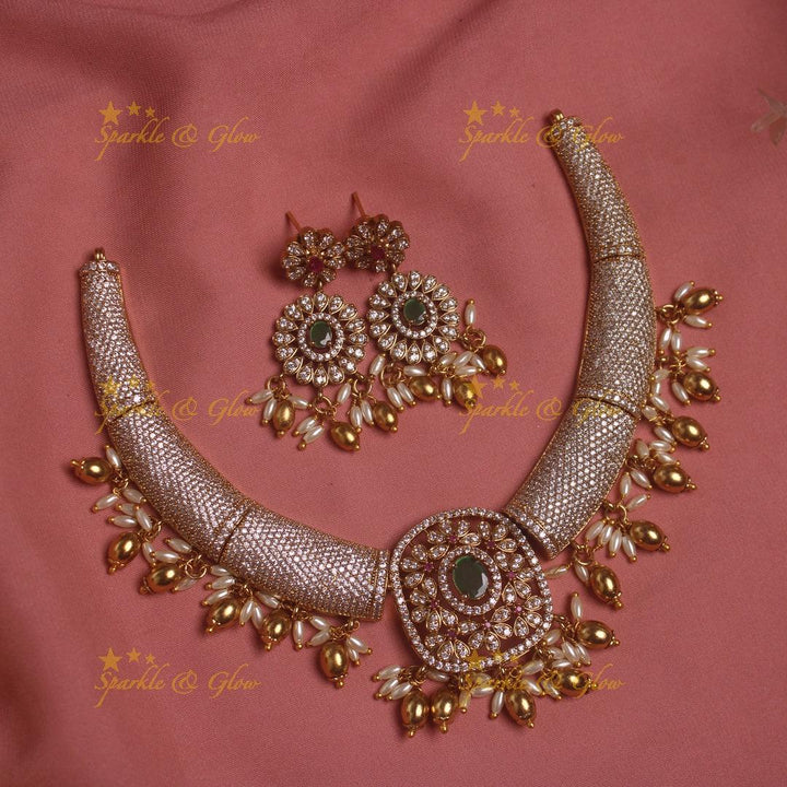 Gorgeous Tribal and floral design AD short necklace with emeralds rice pearls and gold beads - Sparkle and Glow