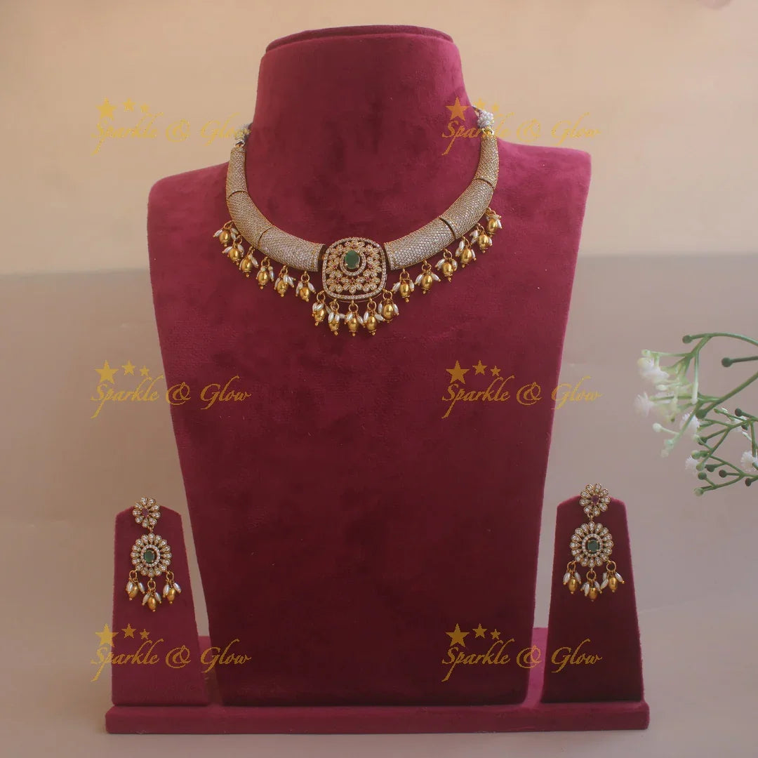 Gorgeous Tribal and floral design AD short necklace with emeralds rice pearls and gold beads - Sparkle and Glow