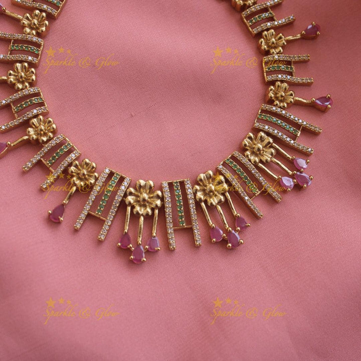 Statement Floral and spike design AD short necklace with ruby stone drops - Sparkle and Glow