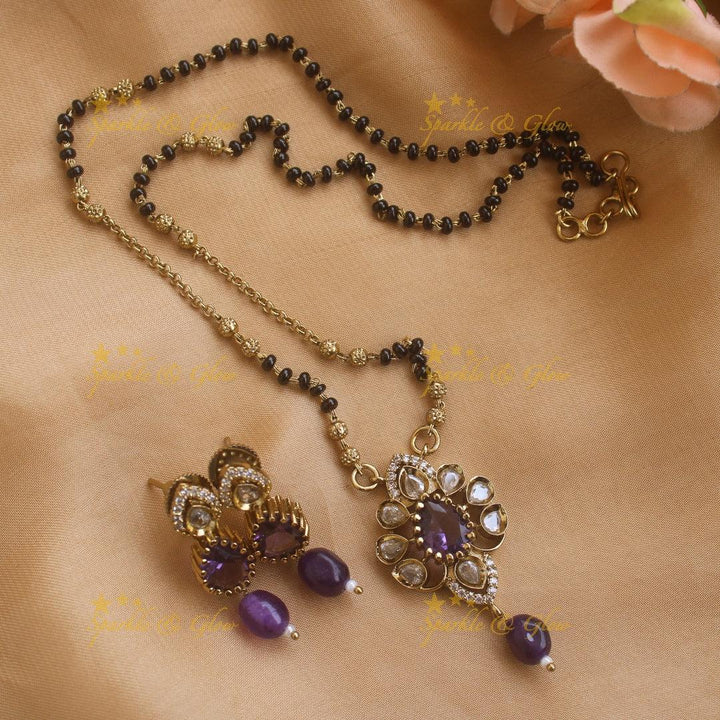 Beautiful Floral design pendant black beads necklace, mangalsutra with maroon beads and stones - Sparkle and Glow