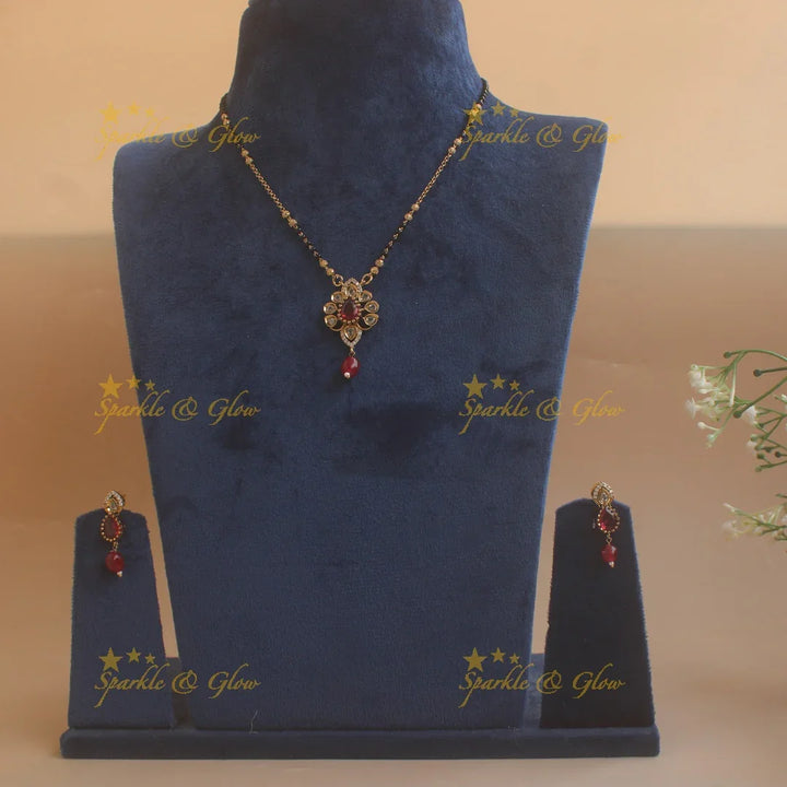 Beautiful Floral design pendant black beads necklace, mangalsutra with maroon beads and stones - Sparkle and Glow