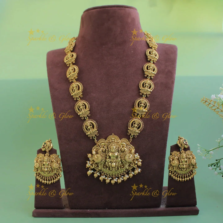 Beautiful Gold alike Lakshmi carved long necklace with ruby emerald and gold beads - Sparkle and Glow