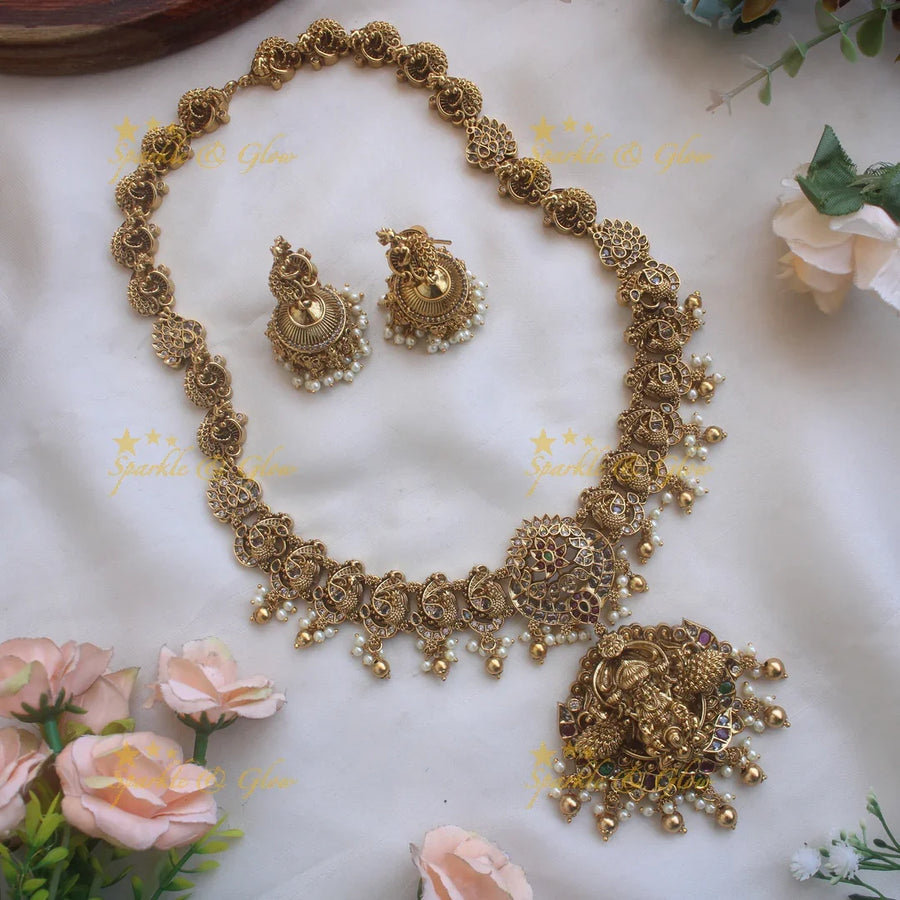 Statement Lakshmi peacock carved long necklace with ruby emerald CZ stones pearls and gold beads - Sparkle and Glow