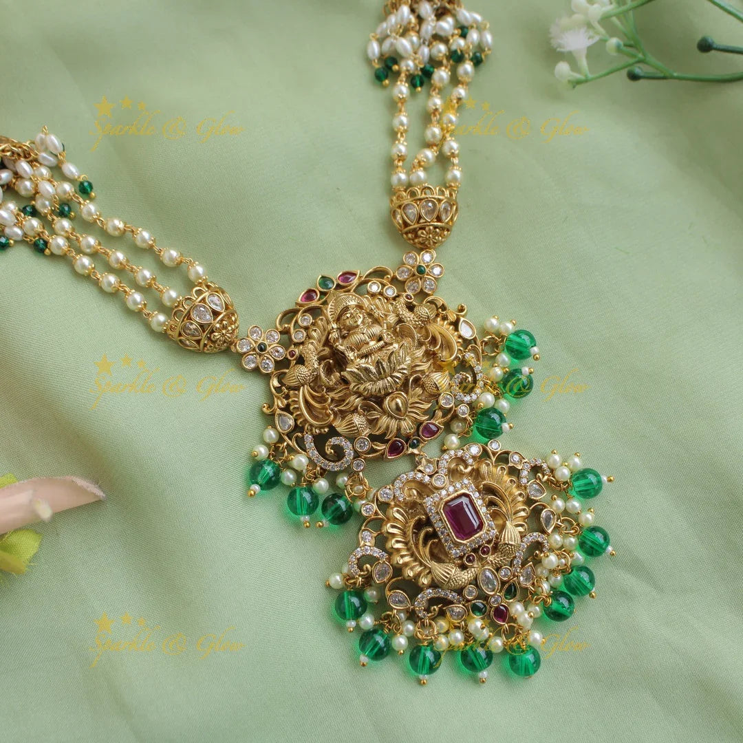 Grand intricate Lakshmi peacock carved long necklace with ruby emerald white stones pearls and green beads - Sparkle and Glow