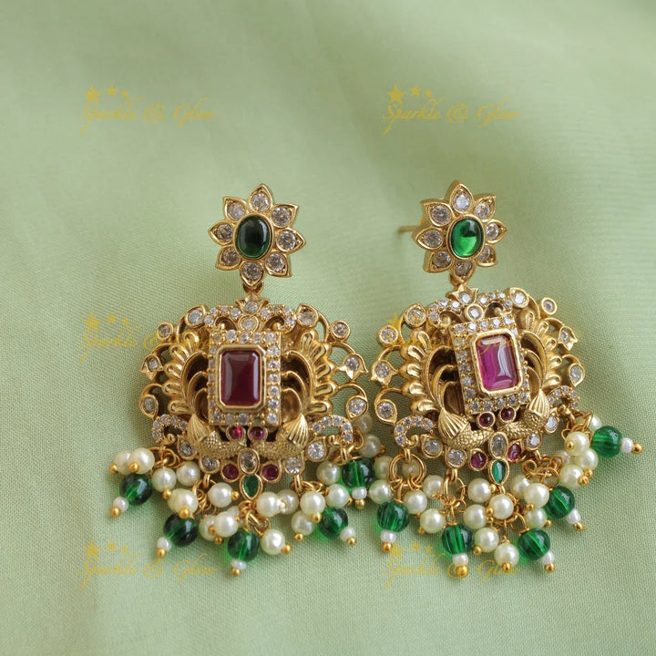 Grand intricate Lakshmi peacock carved long necklace with ruby emerald white stones pearls and green beads - Sparkle and Glow