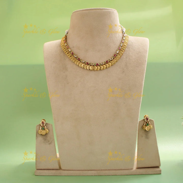 Elegant Premium Matt Lakshmi coin short necklace with ruby and white oval stones - Sparkle and Glow