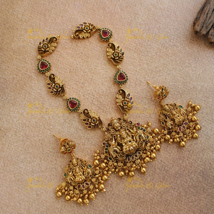Stunning Lakshmi balaji and elephant carved short necklace with ruby emerald and gold beads - Sparkle and Glow