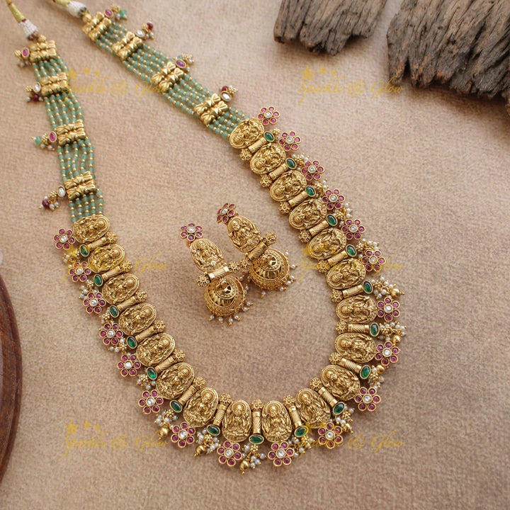 Gorgeous Lakshmi carved floral long necklace with ruby emerald and mint green beads - Sparkle and Glow