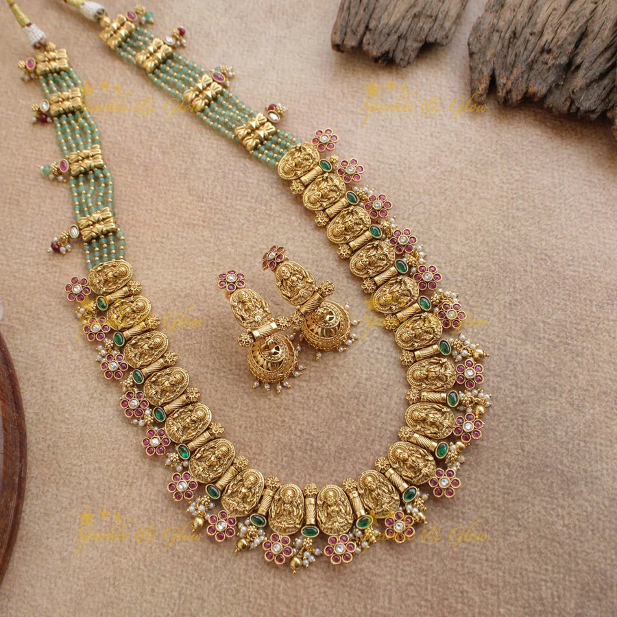 Gorgeous Lakshmi carved floral long necklace with ruby emerald and mint green beads - Sparkle and Glow