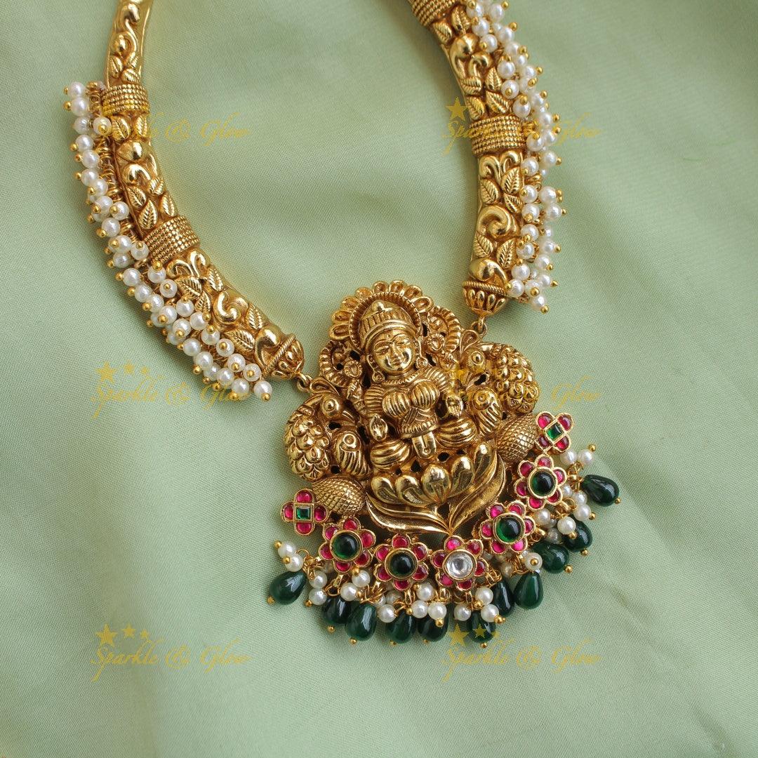 Statement Lakshmi peacock carved gutta pusalu short necklace with ruby emerald and green beads - Sparkle and Glow