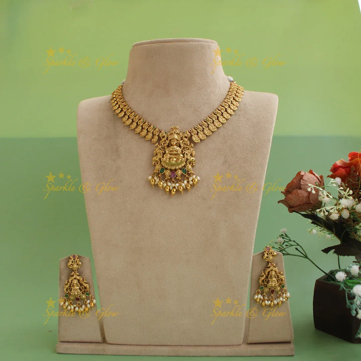 Elegant Premium Matt Lakshmi peacock coin short necklace with ruby emerald and rice pearls - Sparkle and Glow