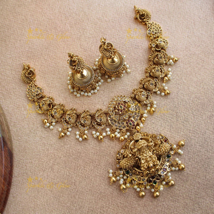 Statement Lakshmi peacock carved short necklace with ruby emerald CZ stones pearls and gold beads - Sparkle and Glow