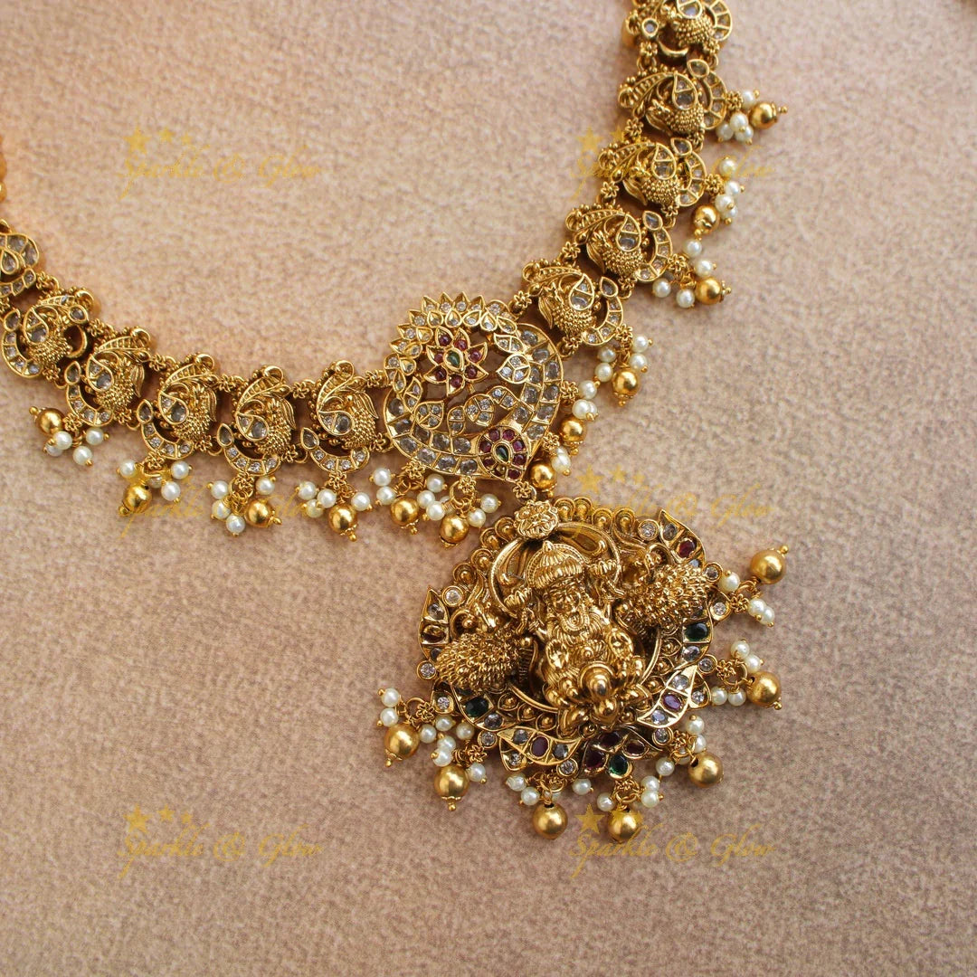 Statement Lakshmi peacock carved short necklace with ruby emerald CZ stones pearls and gold beads - Sparkle and Glow