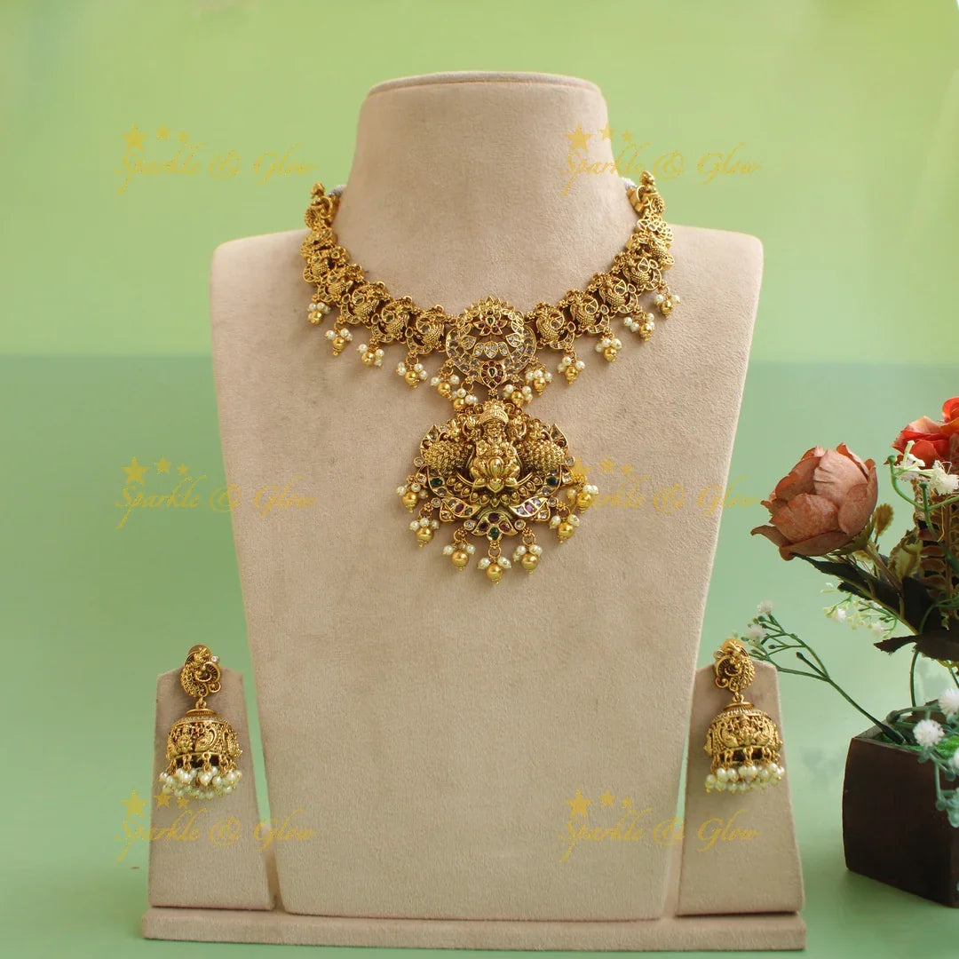 Statement Lakshmi peacock carved short necklace with ruby emerald CZ stones pearls and gold beads - Sparkle and Glow