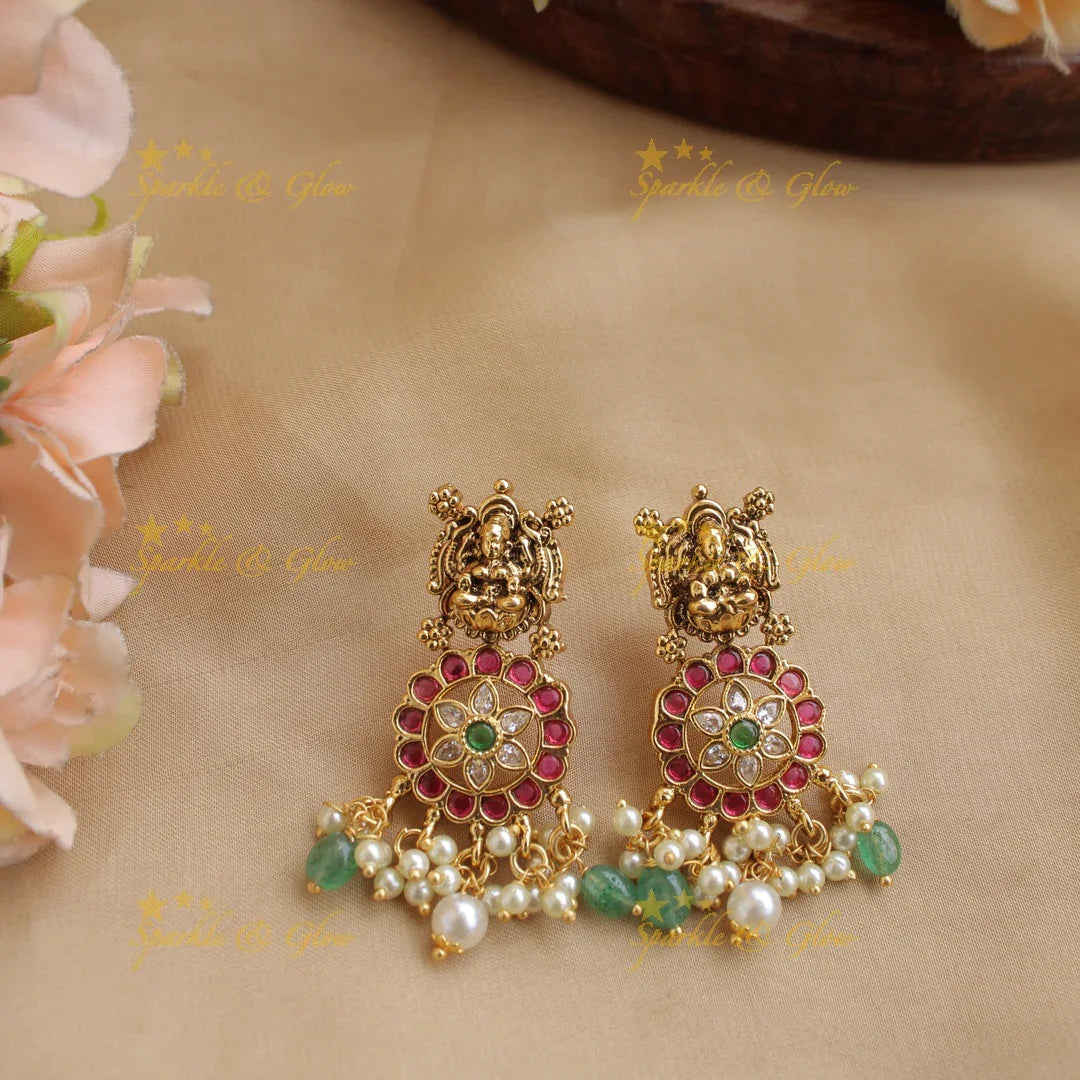 Beautiful Lakshmi peacock carved floral design bottu short necklace with kemp stones and mint green beads - Sparkle and Glow