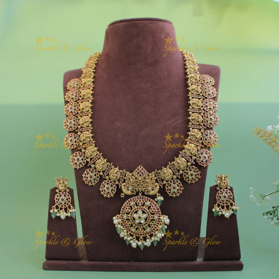 Gorgeous Lakshmi peacock carved floral design bottu long necklace with kemp stones and mint green beads - Sparkle and Glow