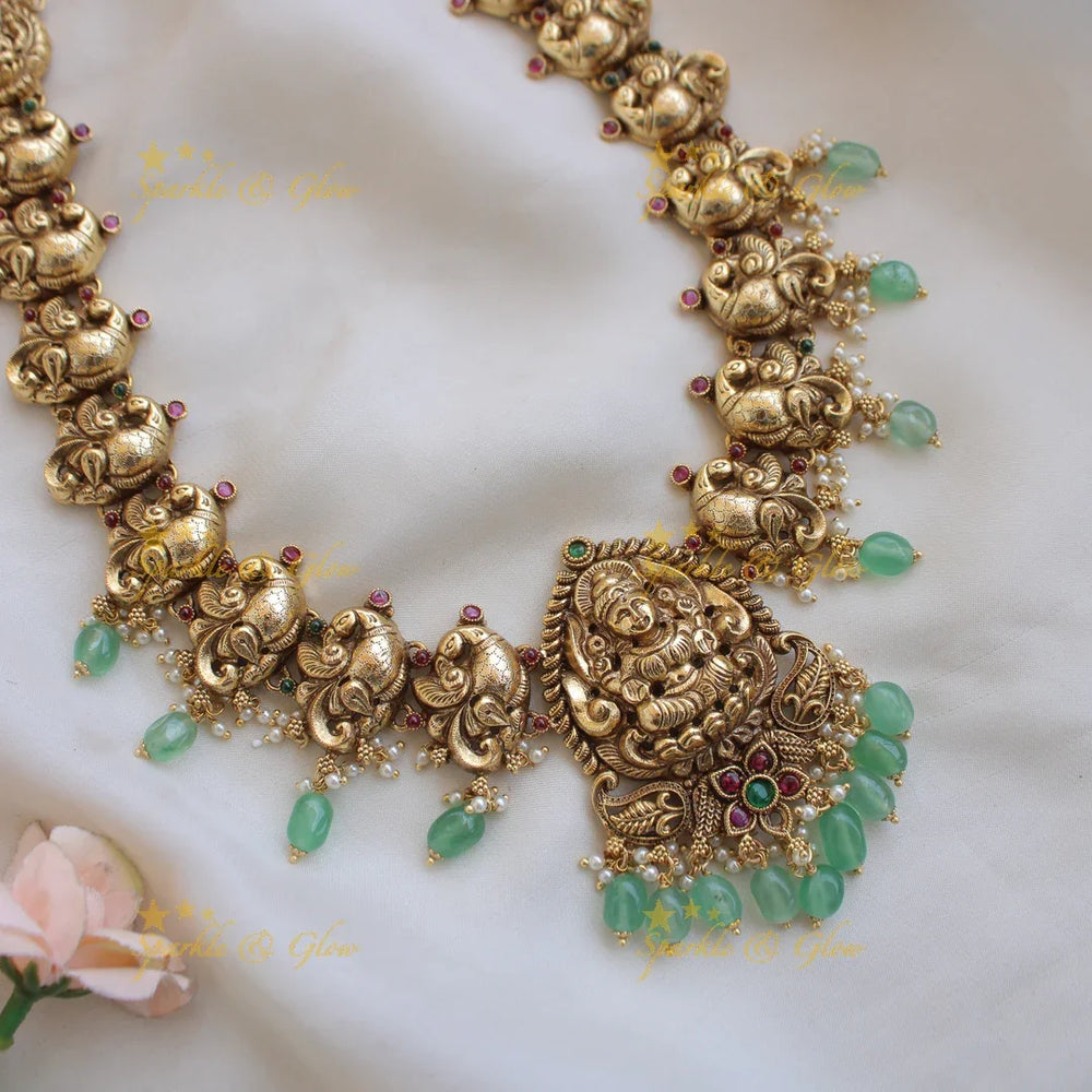 Grand Lakshmi peacock carved long necklace with ruby emerald and mint green beads - Sparkle and Glow