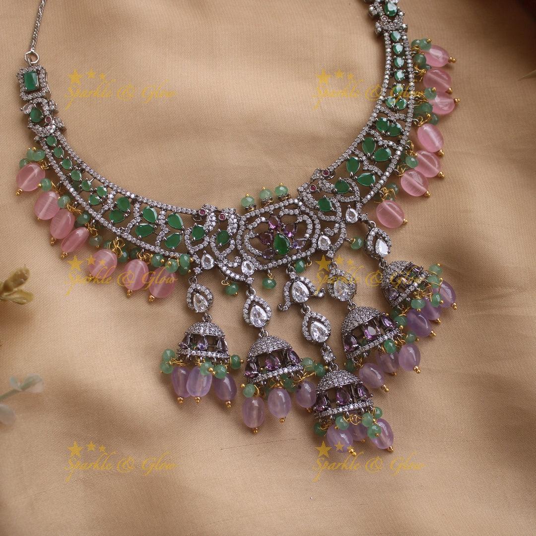 Gorgeous Peacock design black finish victorian AD short necklace with jhumuka drops green stones pink and purple beads - Sparkle and Glow