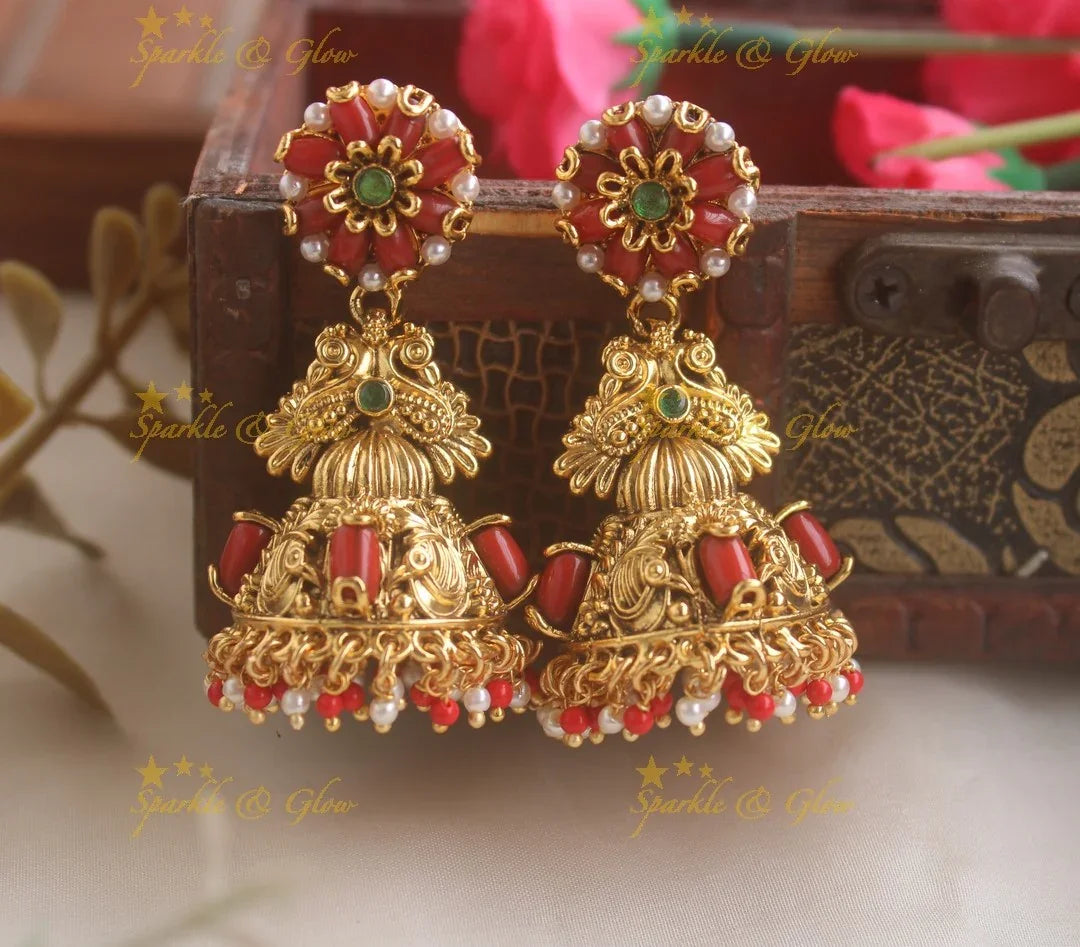 Elegant Peacock Crown design floral jhumukas with coral pearl beads - Sparkle and Glow
