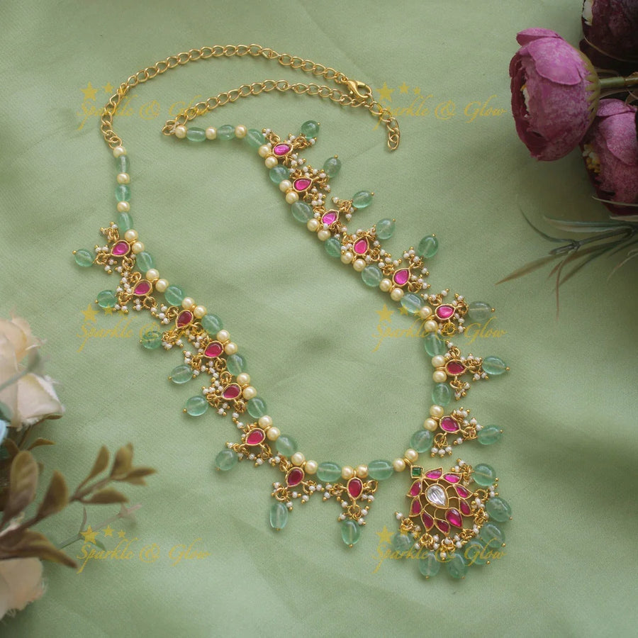 Beautiful Floral design jadau short necklace with pearls and mint green beads - Sparkle and Glow