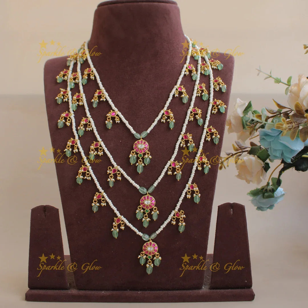 Beautiful Floral design jadau Rani haram with multi layer pearl chain and mint green beads - Sparkle and Glow