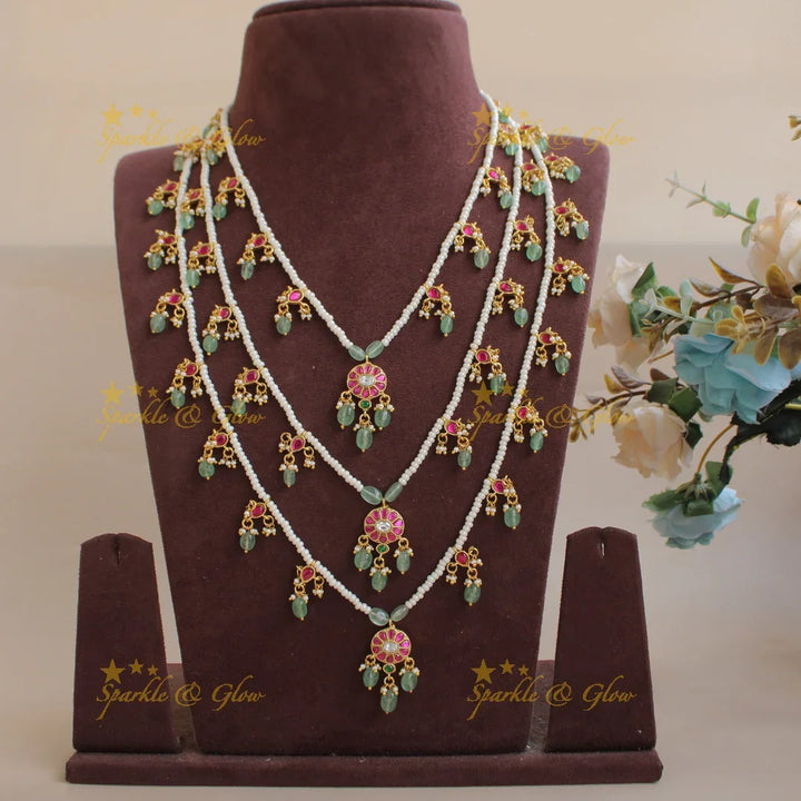 Beautiful Floral design jadau Rani haram with multi layer pearl chain and mint green beads - Sparkle and Glow