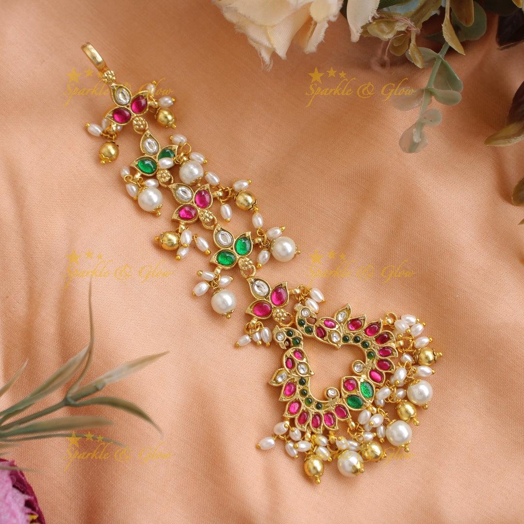 Intricately Carved Jadau Peacock Floral Tikka with Gold and pearl beads - Sparkle and Glow