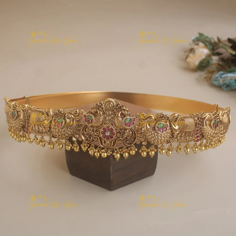 Gorgeous Peacock carved hipbelt with ruby emerald and mint green beads - Sparkle and Glow