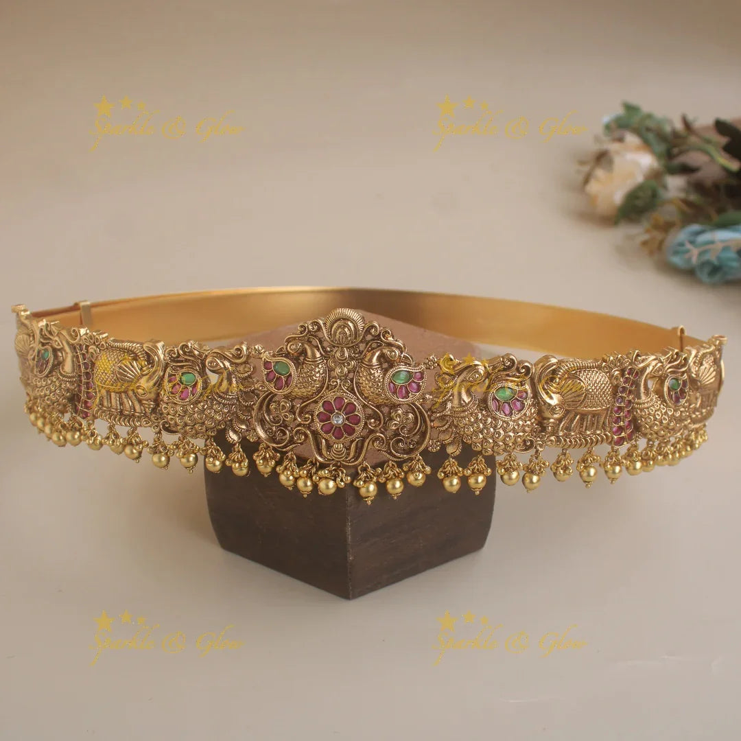 Gorgeous Peacock carved hipbelt with ruby emerald and mint green beads - Sparkle and Glow