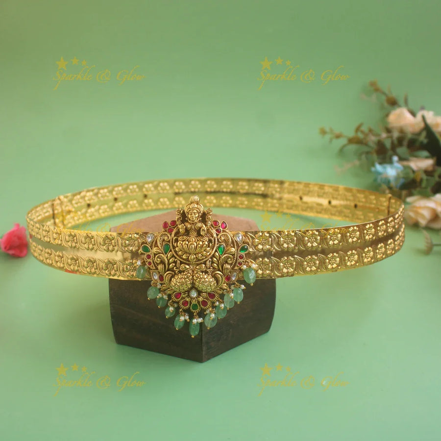 Elegant Lakshmi peacock carved pendant type floral hipbelt with stones and mint green beads - Sparkle and Glow
