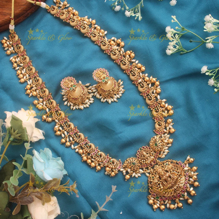 Premium matte Lakshmi peacock carved long necklace with rice and gold beads - Sparkle and Glow