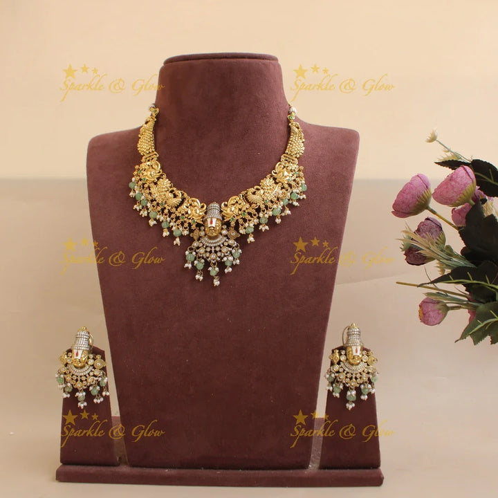 Grand Balaji and peacock carved dual tone Victorian AD short necklace with mint green beads - Sparkle and Glow