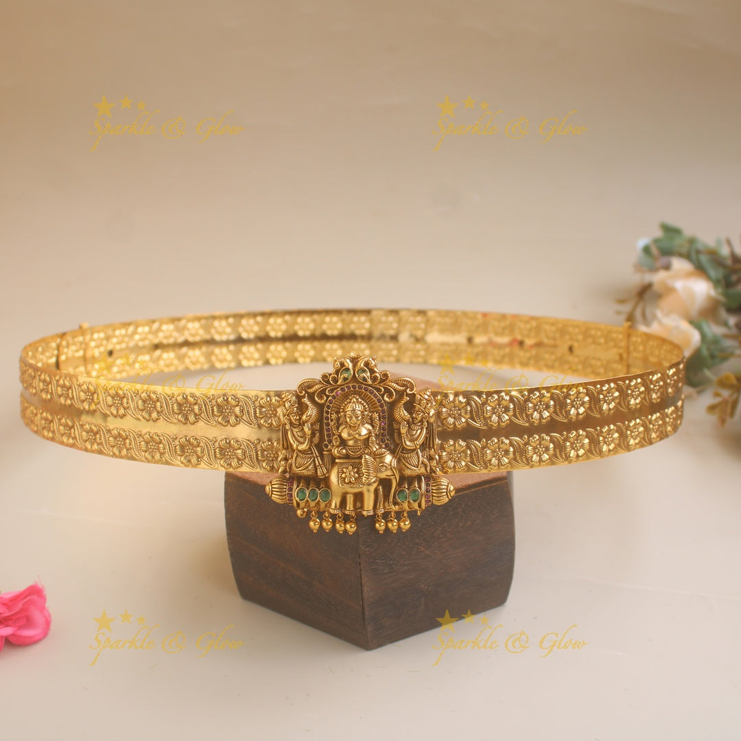 Lakshmi stting on elephant pendant type floral hipbelt with ruby emerald and gold beads