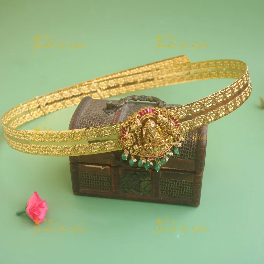 Elegant Lakshmi peacock elephant carved jadau pendant type floral hipbelt with green beads - Sparkle and Glow