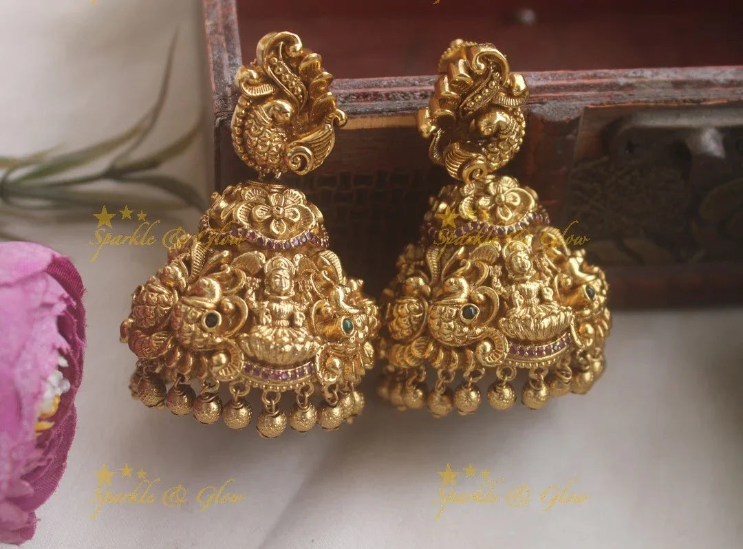 Stunning Lakshmi Peacock Carved floral jhumuka with gold beads - Sparkle and Glow