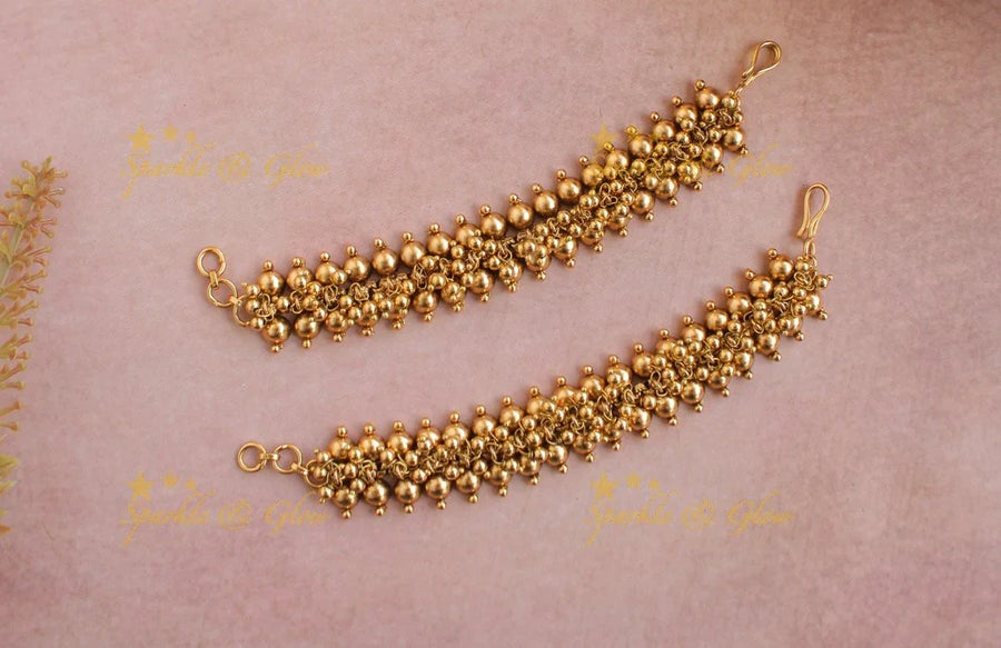 Elegant Gold Cluster Earchain - Sparkle and Glow
