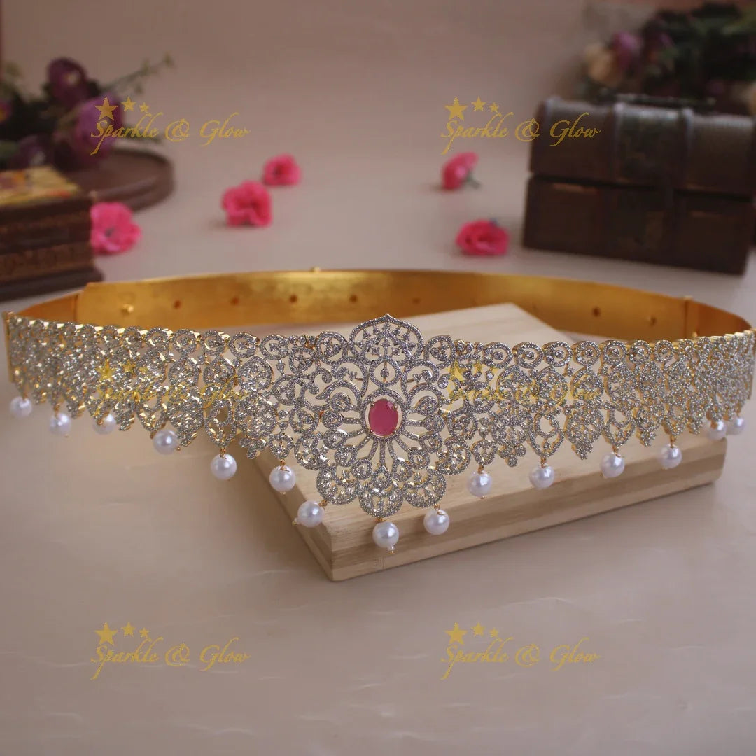Sparkling Floral design American diamond hipbelt with emerald in centre and pearl drops - Sparkle and Glow