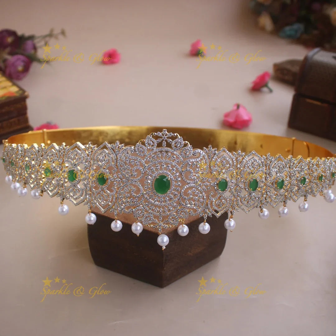 Statement Leaf design American diamond hipbelt with emerald and pearl drops - Sparkle and Glow