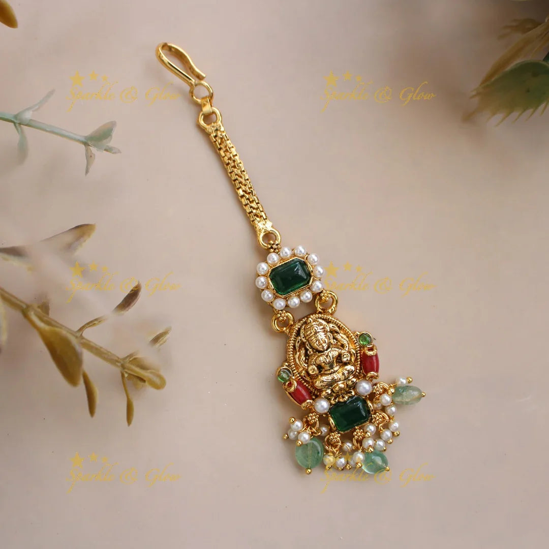 Stunning Lakshmi maang tikka with coral pearls emerald and mint green beads - Sparkle and Glow