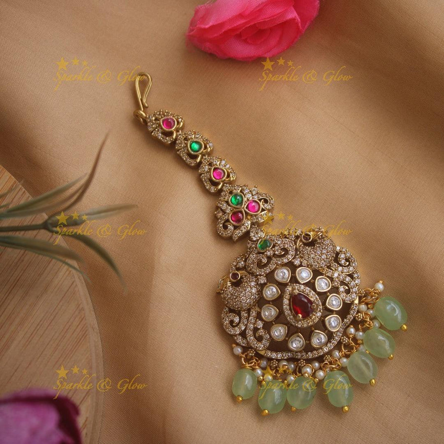 Statement Peacock Floral Victorian AD maang tikka with ruby and mint green beads - Sparkle and Glow
