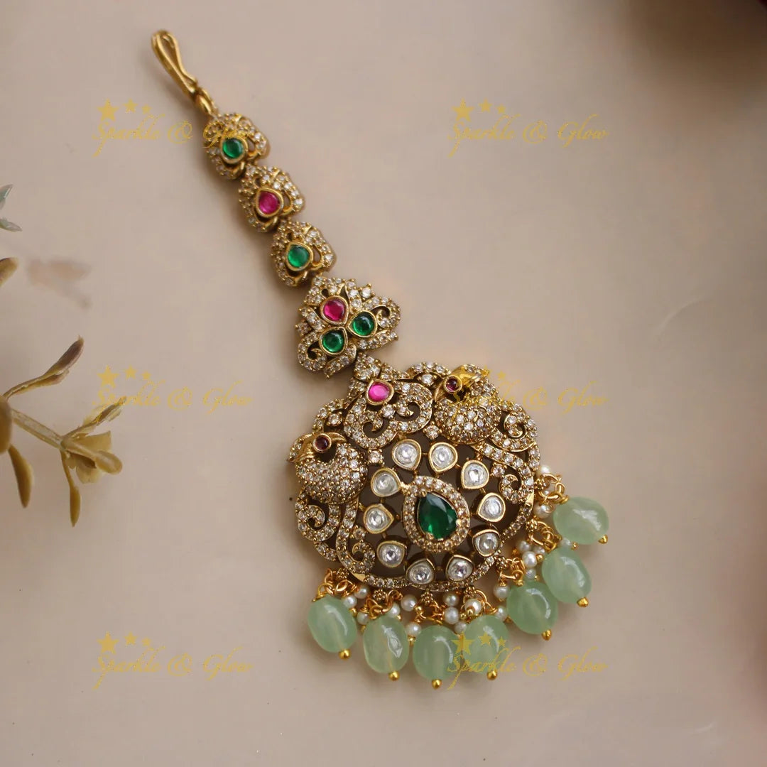 Statement Peacock Floral Victorian AD maang tikka with ruby and mint green beads - Sparkle and Glow