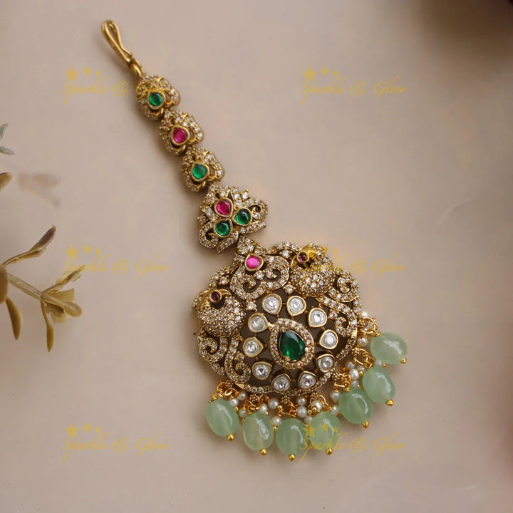 Statement Peacock Floral Victorian AD maang tikka with ruby and mint green beads - Sparkle and Glow