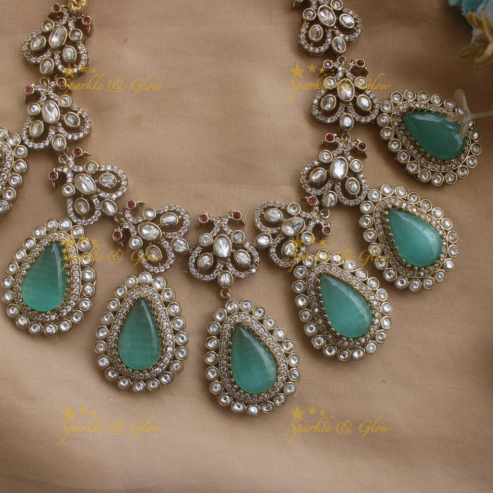Stunning Dual Tone Peacock design victorian AD Necklace with Oval Stone droppings- Mint green - Sparkle and Glow