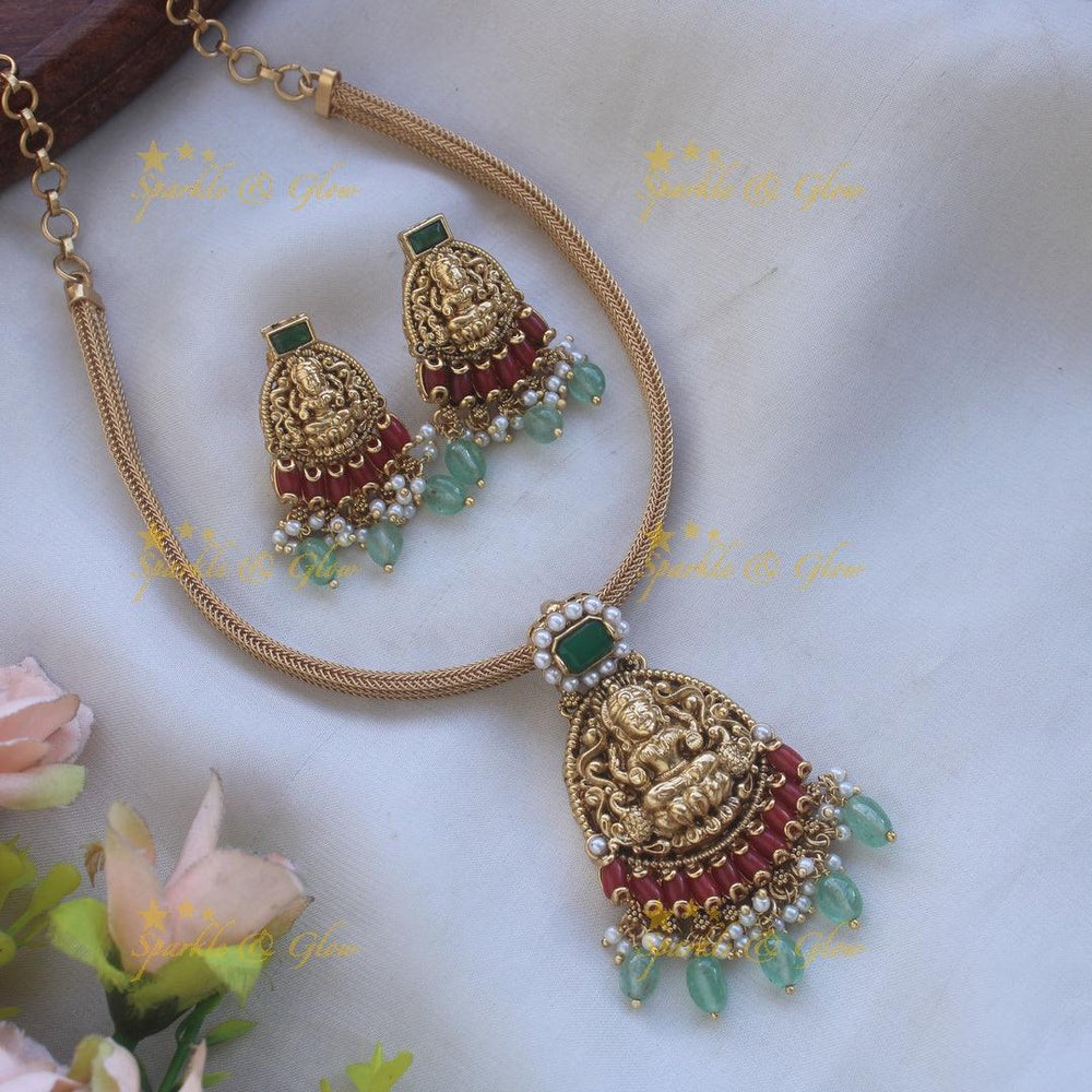 Beautiful Lakshmi peacock carved pendant Chain with coral emerald and mint green beads - Sparkle and Glow