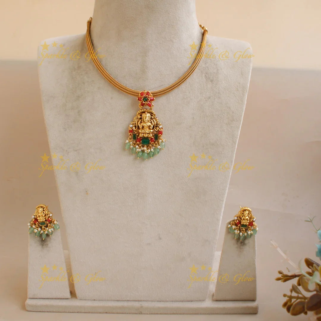 Elegant Lakshmi floral design pendant Chain with coral emerald and mint green beads - Sparkle and Glow