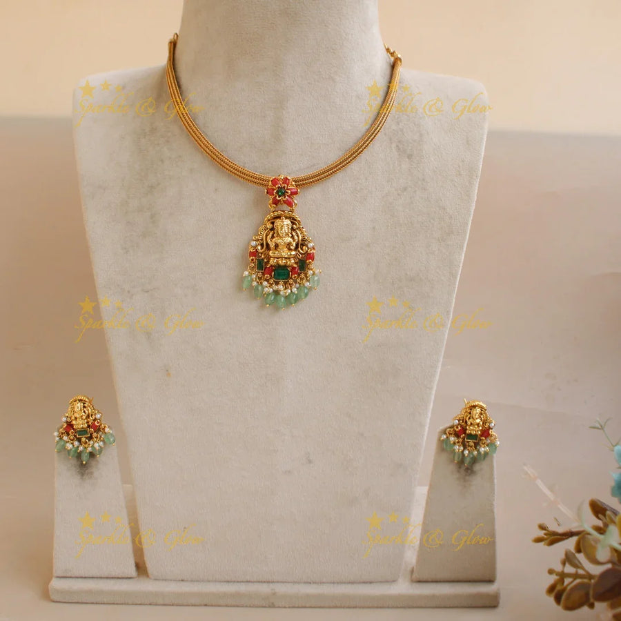 Elegant Lakshmi floral design pendant Chain with coral emerald and mint green beads - Sparkle and Glow