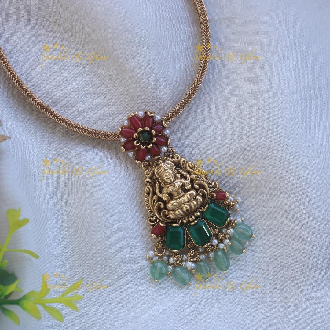 Stunning Lakshmi floral design pendant Chain with coral emerald and mint green beads - Sparkle and Glow