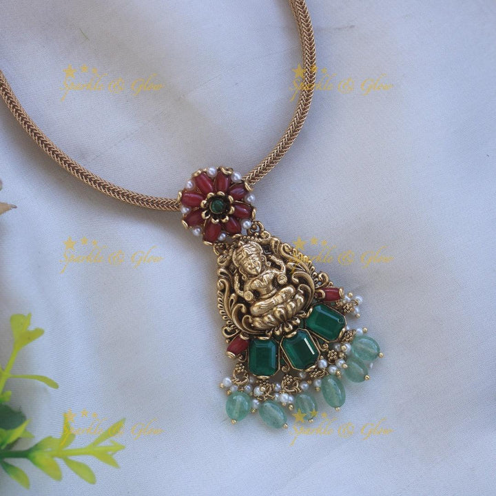 Stunning Lakshmi floral design pendant Chain with coral emerald and mint green beads - Sparkle and Glow